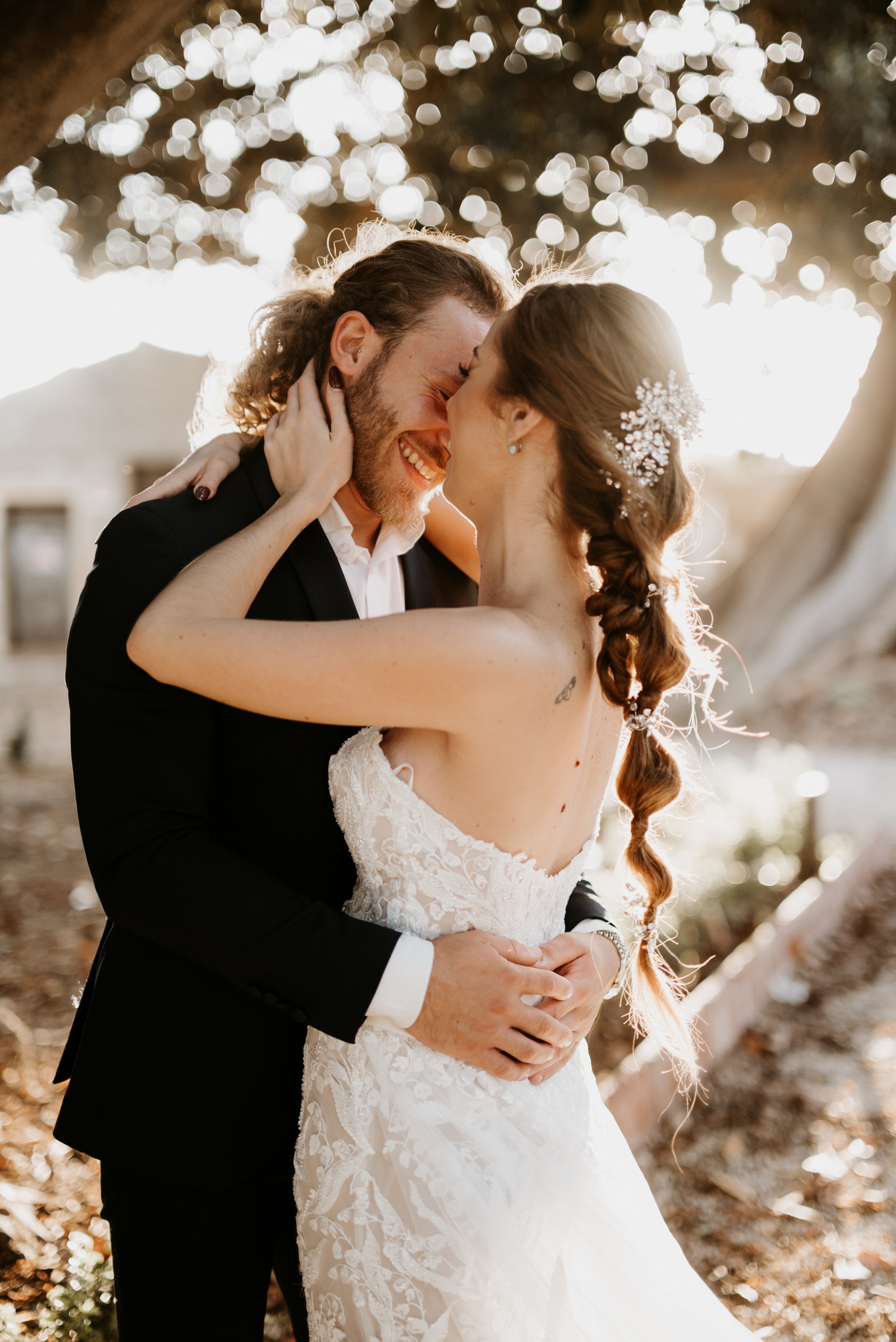 wedding photographer castello donnafugata ragusa italy outside bride and groom kiss